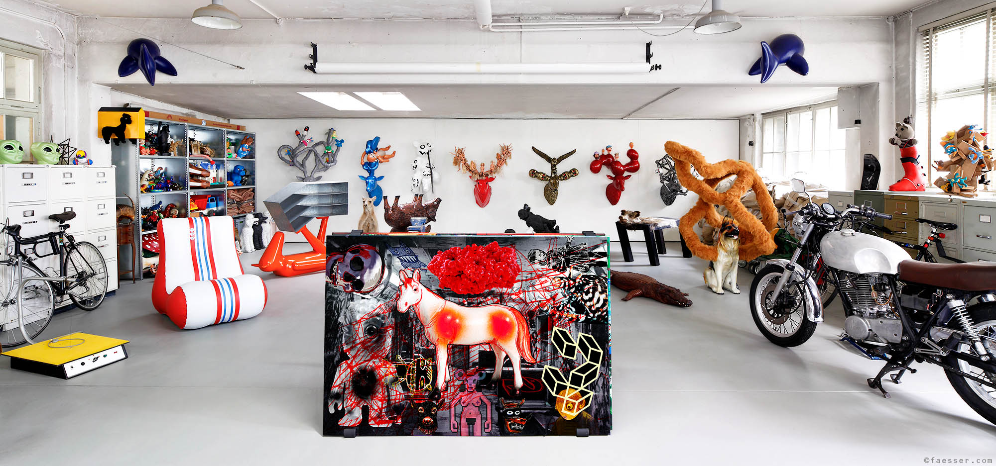 Studio gallery with trophies, sculptures and digital paintings at studio Zurich; works of art as figurative sculptures and digital paintings; artist Roland Faesser, sculptor and painter 2011